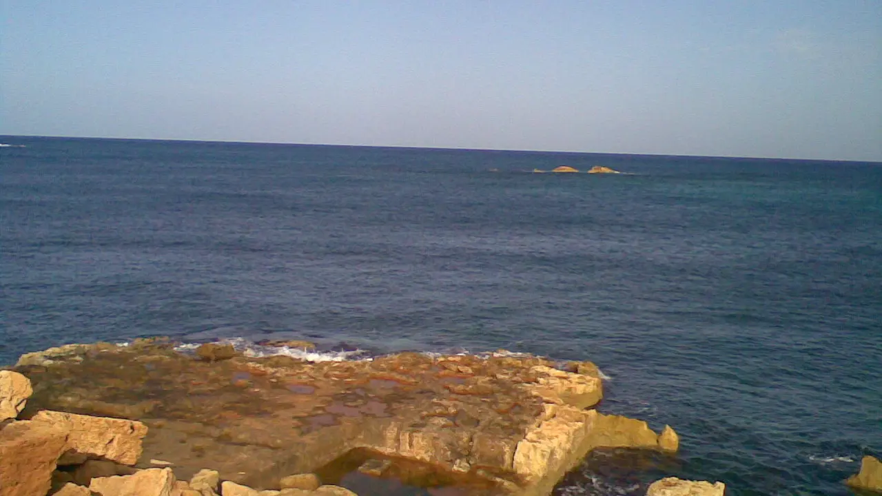 Zona portului antic Apollonia, la Susah, pe coasta Libiei, cu apa mării peste structurile scufundate